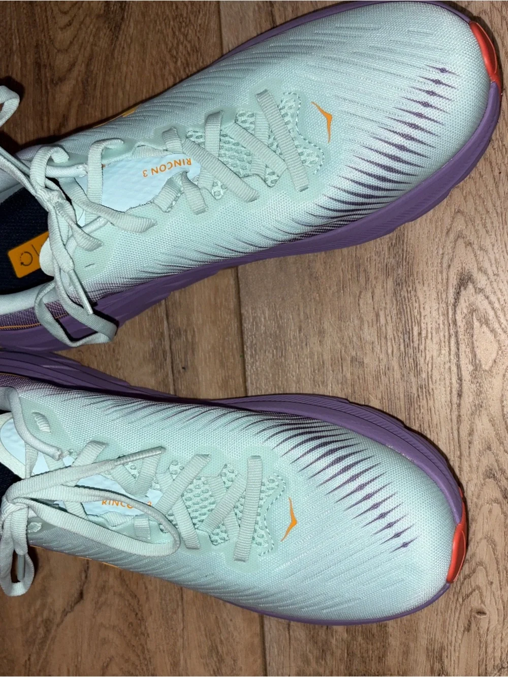 Hoka Women's Mint and Lavender Athletic Running Shoes with Orange Logo